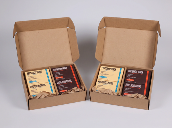 Two PROTY Nedelja bez stresa 2xPolaPola boxes with the product packaging displayed in a professional photoshoot.